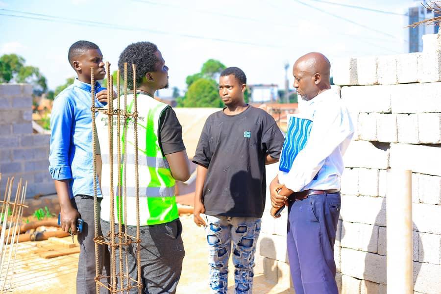 University Staff Interact with the Staff in Wabigalo
